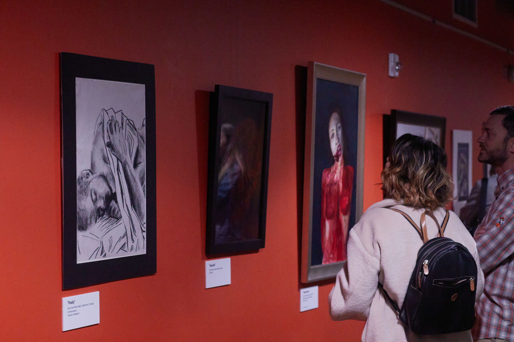 People looking at gallery